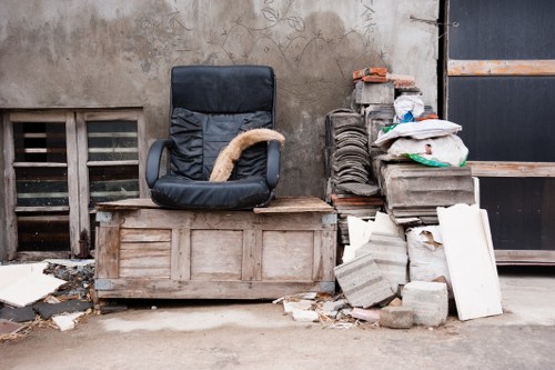 Workers sorting recyclables during a Kenton house clearance job