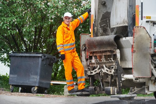 Crew preparing for a house clearance job with safety gear